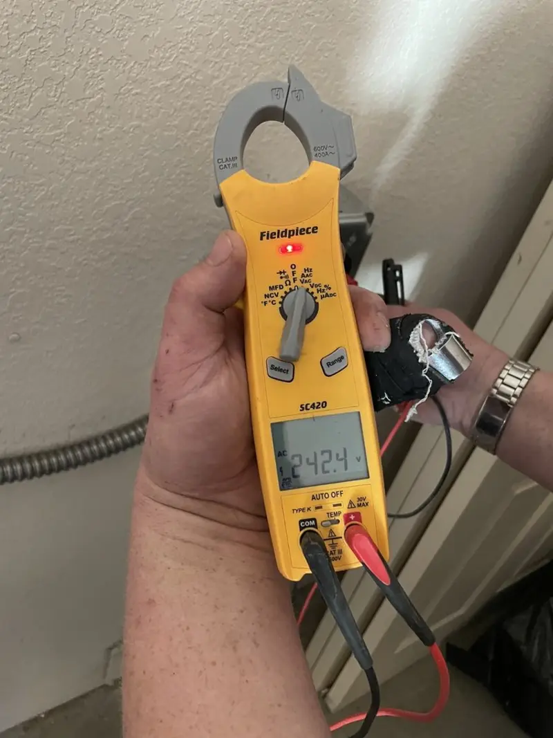 Voltage testing with clamp meter during Circuit Breaker Repair in Oak Point